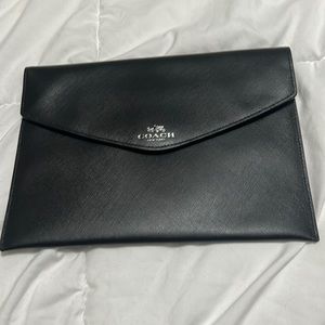 Coach leather envelope with zipper on back- new with tags